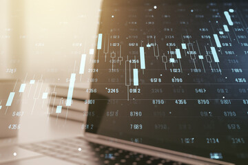 Multi exposure of stats data illustration on modern laptop background, computing and analytics concept