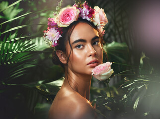Beauty, flowers and woman with a crown in studio for skincare, cleaning and wellness with product...