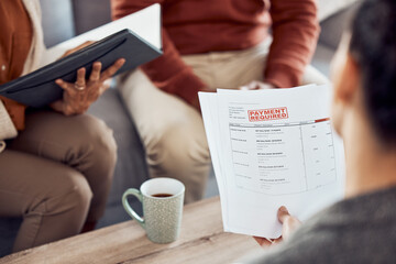 Couple, finance advisor and documents in house living room or home for debt planning, taxes or mortgage loan support. Women, man and financial paper in audit, bad investment and insurance management