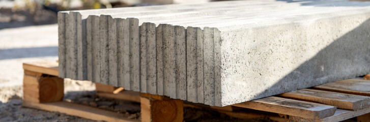 curb Close-up on the installation and installation of a concrete curb at a road construction site