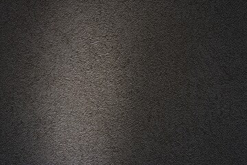Obraz premium Black Stucco Wall Texture Background with Light Beam.