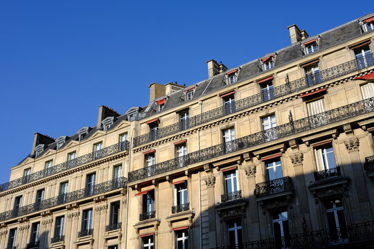 Vintage House in Paris with Blue Sky.