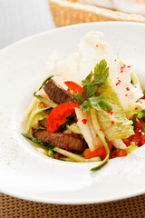 salad with meat and hot pepper