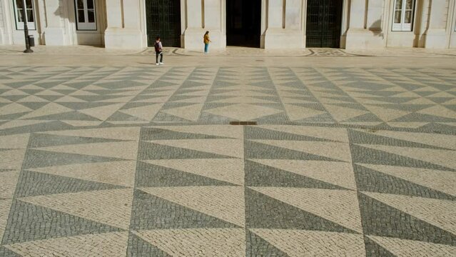 Establishing shot of the City Hall, located in the City Square, Santa Maria Maior, in Lisbon, Portugal on a sunny day