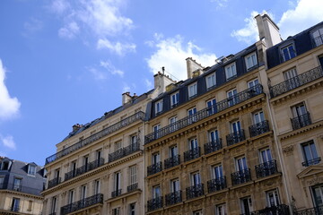 Vintage House in Paris with Blue Sky.