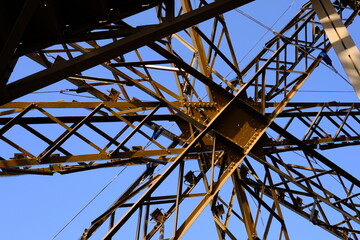 Close up Metal Structure of Eiffel Tower with Blue Sky.