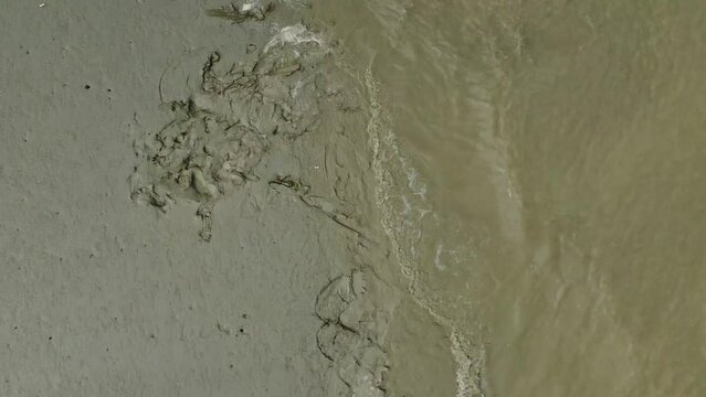 Waves rolling on empty Ganges banks. West Bengal. India. Aerial looking down.