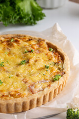 Traditional homemade pie with salmon fish and broccoli