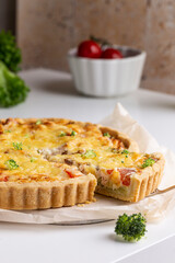 Freshly baked quiche with salmon and broccoli
