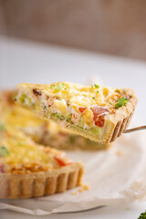 Dinner with fresh homemade pie with salmon fish and broccoli, quiche