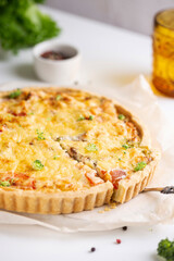Freshly baked quiche with salmon and broccoli