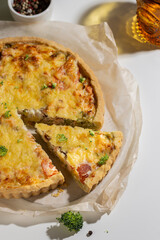 Freshly baked quiche with salmon and broccoli
