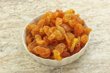 Sweet yellow raisin in the bowl