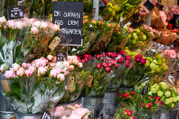 The counter of a flower store in Germany is full of fresh flowers