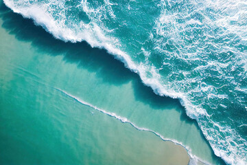 Top view of waves breaking on a beach, water splits the composition in half, tropical island, Beautiful Beach Sand Landscape Copyspace Background.