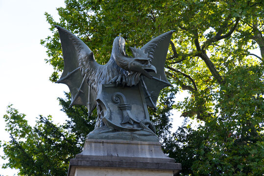 Metal sculpture of Basilisk, a mythological creature combination of cock, dragon and snail at Wettstein Bridge at City of Basel on a sunny summer day. Photo taken August 24th, 2022, Basel, Switzerland