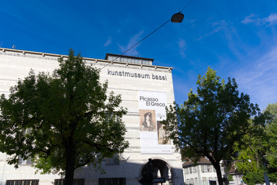 White stone facade of Art Museum at City of Basel with poster of Picasso exhibition El Greco on a sunny summer day. Photo taken August 24th, 2022, Basel, Switzerland.
