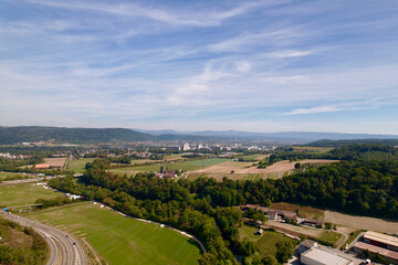 Aerial view of City of Pratteln, Canton Basel-Landschaft, on a sunny summer day. Photo taken August 24th, 2022, Pratteln, Switzerland.