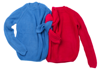 Two sweaters, blue and red, one near the other, like a pair, with tied sleeves, isolate, concept