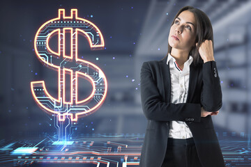 Cyber and digital money concept with bright yellow dollar sign with circuit inside and pensive businesswoman on blurred background