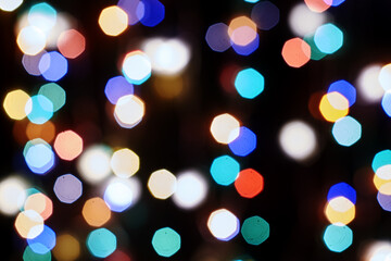 multicolored festive lights on a black background screensaver backdrop