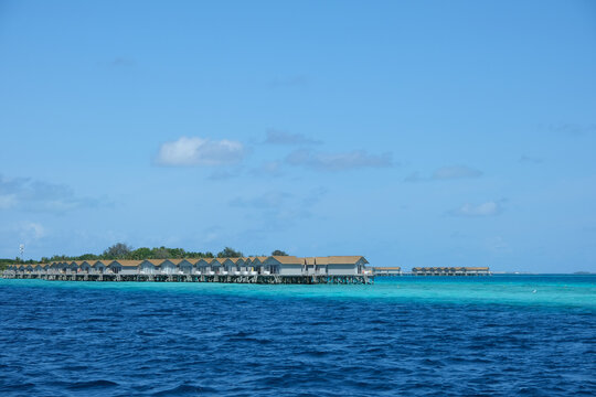 Beautiful baa atoll with tropical stilts house near Male, Maldives.