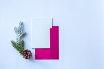 Dark pink envelope with a blank white sheet of paper