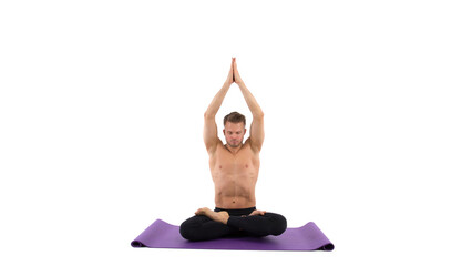 Lotus position. Young attractive man is doing yoga. White background.