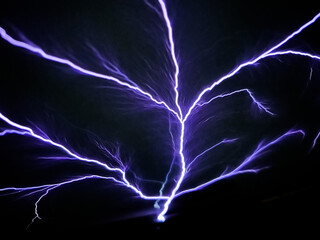 Saint elmo's fire.Lightning strike on airplane cockpit window during flying through thunderstorm clouds. Saint elmo's light. Weather phenomenon in which luminous plasma created by corona discharge. 