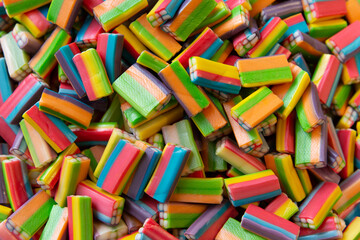 A bunch of multi-colored candies similar to an eraser or a sandwich, close-up shooting, color texture
