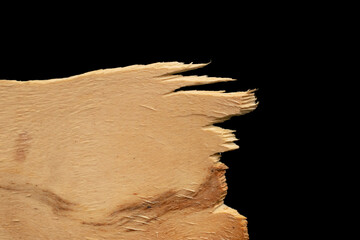 pieces of wood plywood on a black background