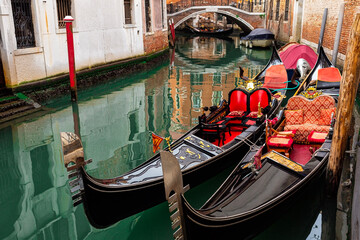 Fototapeta na wymiar Gondolas in one of the Canal of Venice.