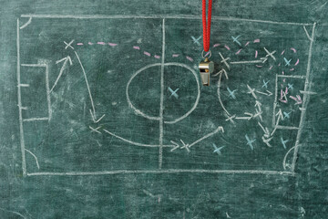 Whistle of soccer referee or trainer and soccer tactics scribble for a solo effort. Great soccer event this year, free copy space