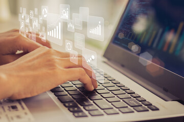 Businesswoman using laptop in data management	