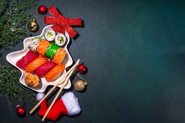 Sushi for Christmas New Year party, winter holiday food delivery menu mockup.  Sushi set on...
