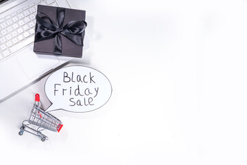 Black friday sale background. Simple black flat lay with sign 