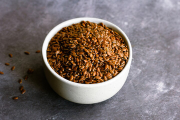 Healthy Flaxseeds in a Bowl on Dark Background, Healthy Food Photography
