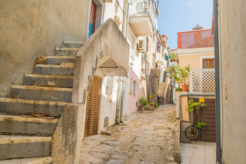 Old romantic street and stairs in historic town of Baska on Krk island in Croatia