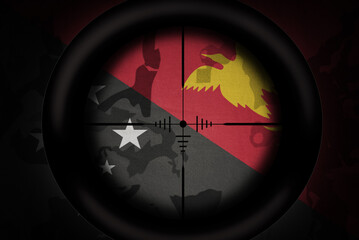 sniper scope aimed at flag of Papua New Guinea on the khaki texture background. military concept. 3d illustration