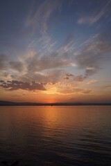 Fototapeta na wymiar Amazing sunrise view with natural clouds. Morning sun with beautiful colors