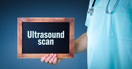Ultrasound scan (sonogram). Doctor shows sign/board with wooden frame. Background blue