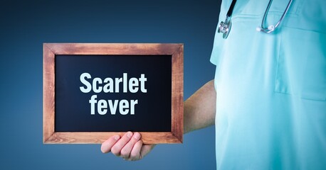 Scarlet fever. Doctor shows sign/board with wooden frame. Background blue