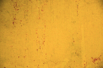 Aged yellow weathered textured background.