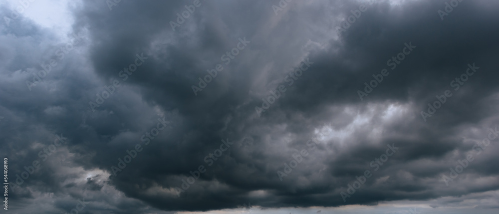 Aufkleber the dark sky with heavy clouds converging and a violent storm before the rain.bad or moody weather s