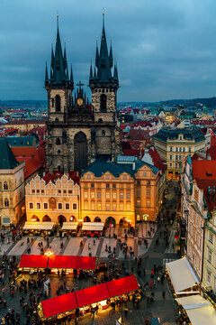 View of Tyn church and Christmas market on Old Town Square in Prague.