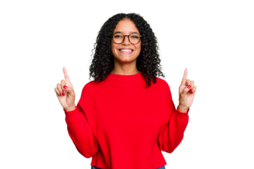 Young cute brazilian woman isolated indicates with both fore fingers up showing a blank space.