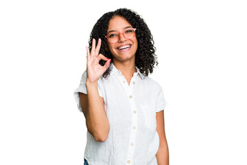 Young cute brazilian woman isolated cheerful and confident showing ok gesture.