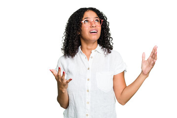 Young cute brazilian woman isolated screaming to the sky, looking up, frustrated.