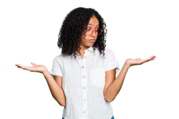 Young cute brazilian woman isolated confused and doubtful shrugging shoulders to hold a copy space.