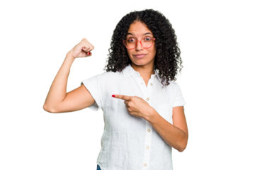 Young cute brazilian woman isolated showing strength gesture with arms, symbol of feminine power